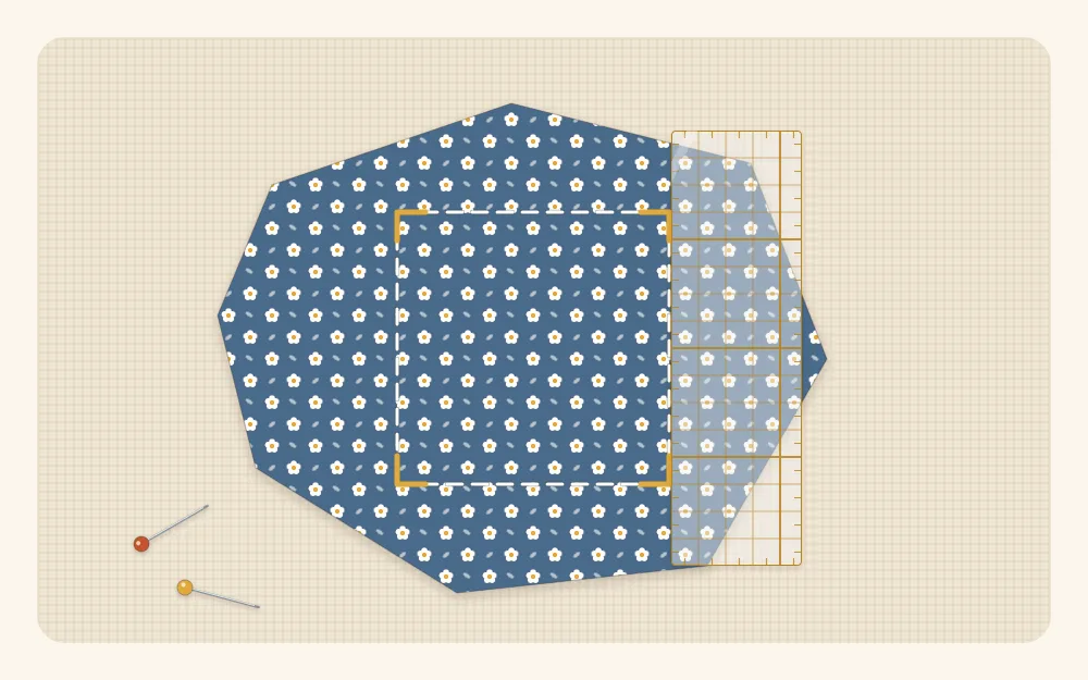 Illustration of an irregular fabric scrap with a square outline marked inside it