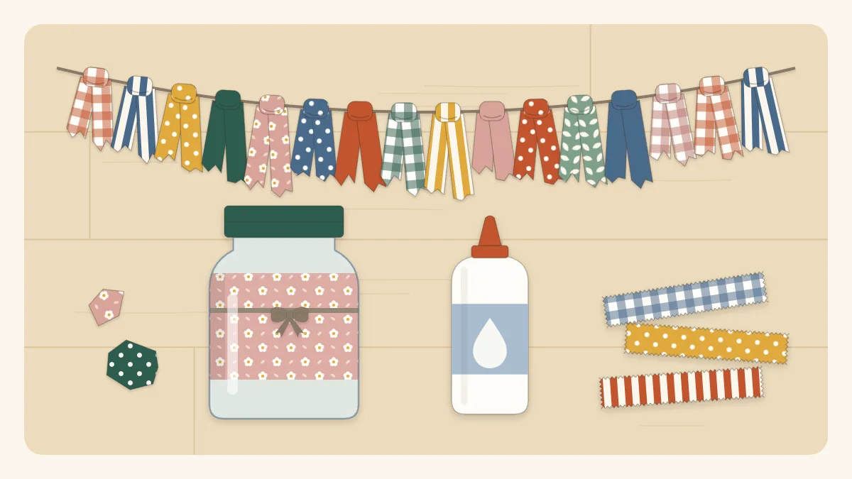 A jar wrapped in print fabric, a knotted fabric strip garland and a bottle of glue