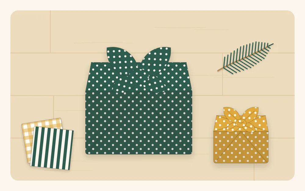 Illustration of a small box wrapped in a square of polka dot fabric with the corners knotted on top